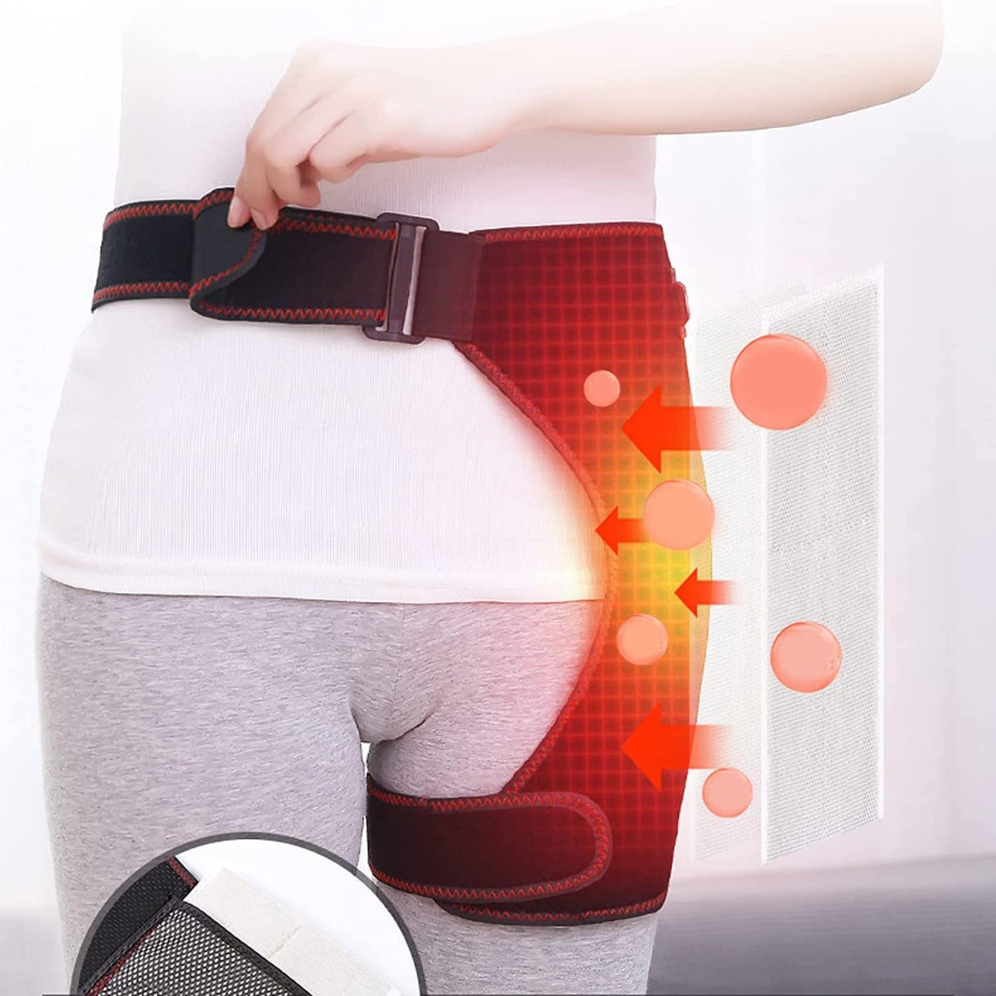 Hip and thigh heat therapy wrap for pain relief, shown on person with adjustable straps