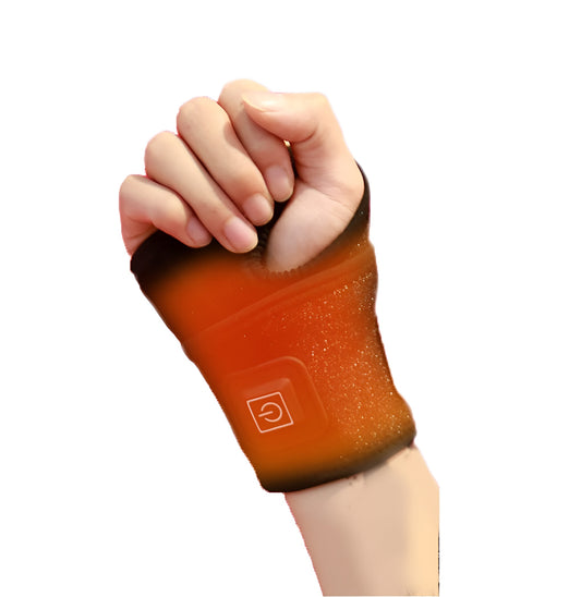 Hand wearing an orange heated therapy glove for pain relief and mobility support