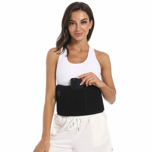 Woman wearing a black heated therapy belt for back pain relief